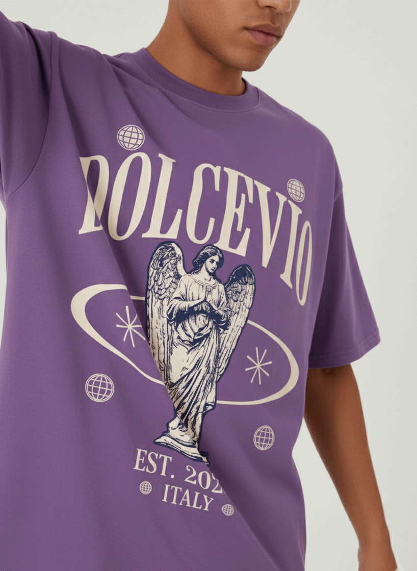 Purple t-shirt with 'Dolcevio' and angel graphic on a plain background
