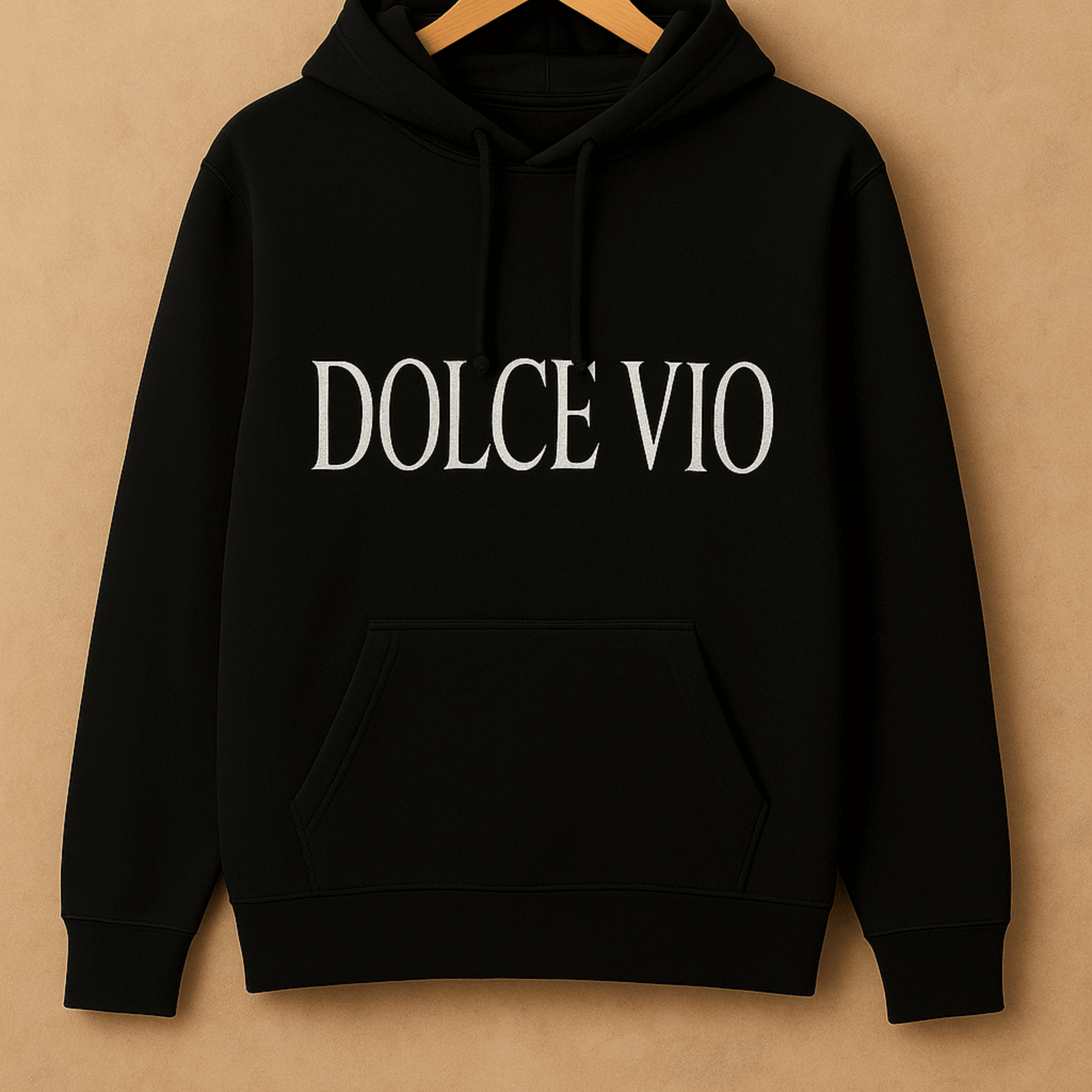 Black hoodie with 'DOLCE VIO' text on a beige background