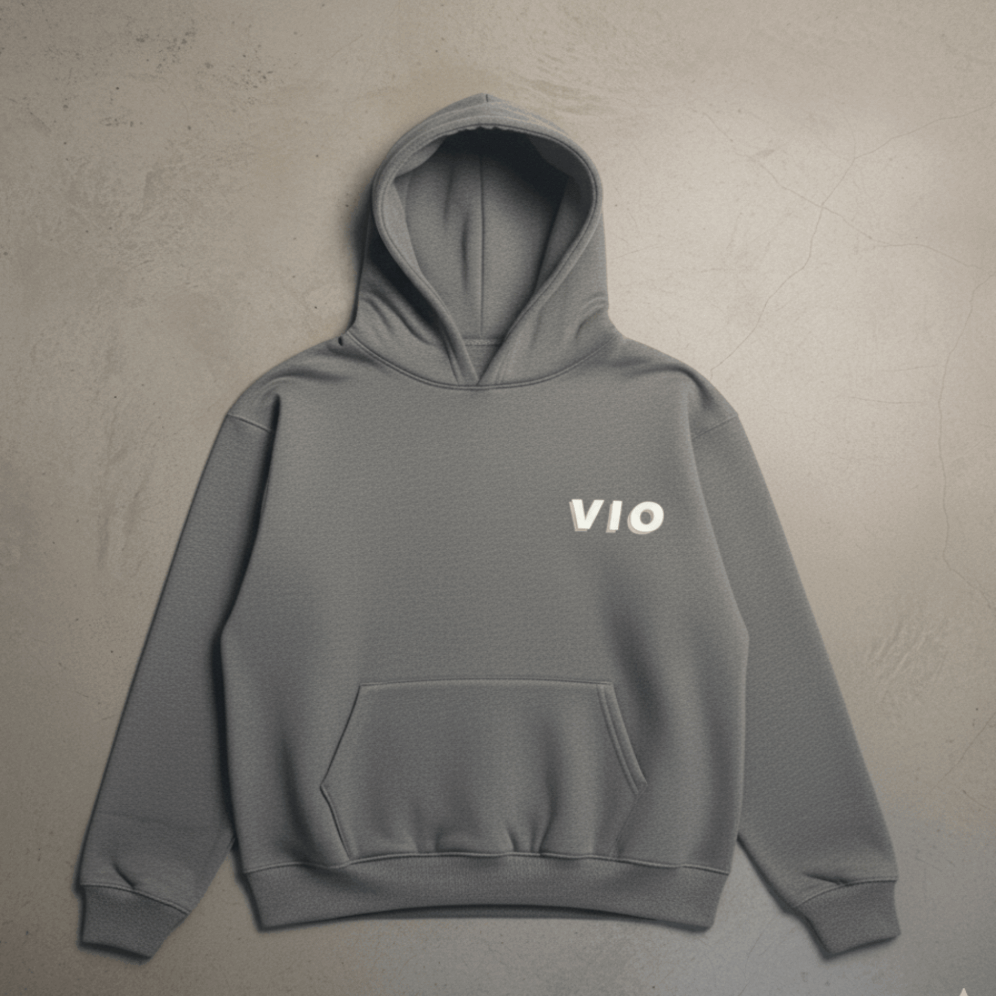 Gray hoodie with 'VIO' logo on a beige background